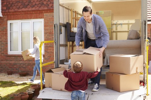 Local movers planning a removal van job in an Enfield residential street