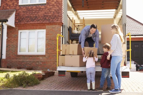Furniture removals team handling bulky household items in Enfield