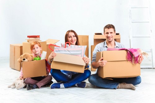 Local Enfield removals van loading household items for transport