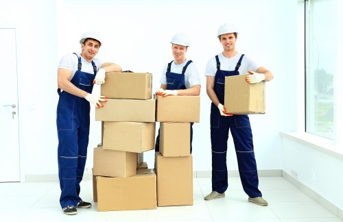 Careful loading of household items into a moving van