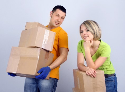 Packed boxes and furniture ready for removal services in Enfield