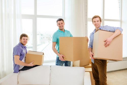 Packed office supplies and labelled boxes prepared for a commercial move in Enfield