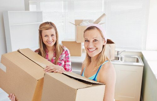 Packed boxes and furniture ready for a flat relocation